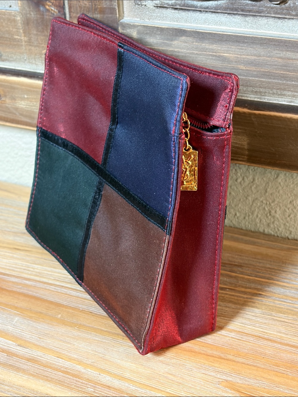 Vintage Yves Saint Laurent (YSL) Parfums multicolor makeup clutch/Pouch.